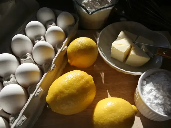 Unwaxed fresh yellow lemons, softened butter, eggs, caster sugar, flour and granulated drizzle sugar