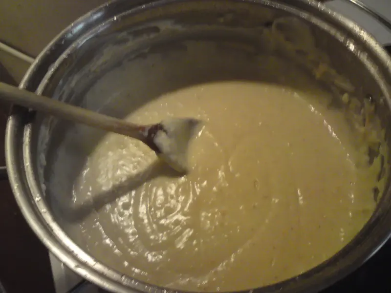 Melt the Cheddar off the heat - Step 4 for Classic Welsh Rarebit with Cheddar and Mustard