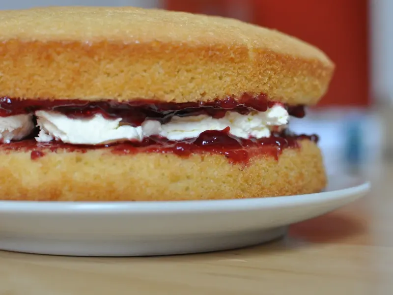 Whip the cream, assemble and serve - Step 6 for Classic Victoria Sponge Cake with Jam and Cream